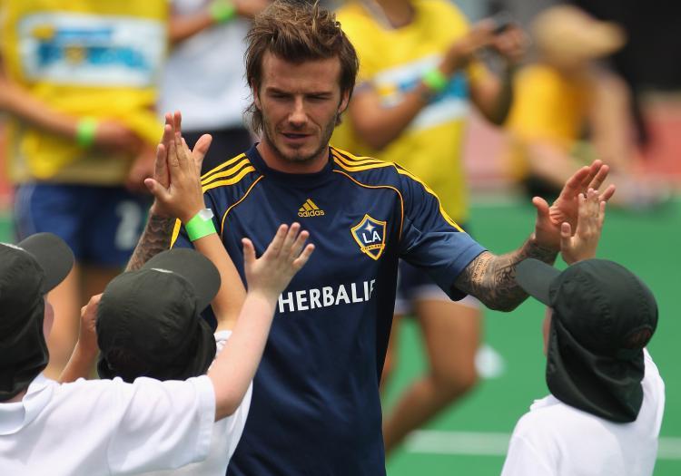 <a><img src="https://www.theepochtimes.com/assets/uploads/2015/09/107150187.jpg" alt="David Beckham, of the Galaxy, with school children during an LA Galaxy and Newcastle Jets Children's Football Clinic, on Nov. 26, in Newcastle, Australia.  (Photo by Mark Kolbe/Getty Images)" title="David Beckham, of the Galaxy, with school children during an LA Galaxy and Newcastle Jets Children's Football Clinic, on Nov. 26, in Newcastle, Australia.  (Photo by Mark Kolbe/Getty Images)" width="320" class="size-medium wp-image-1811635"/></a>