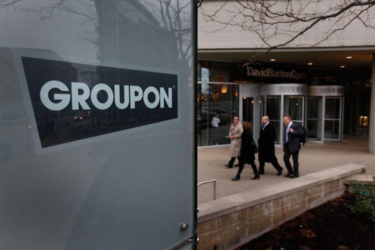 <a><img src="https://www.theepochtimes.com/assets/uploads/2015/09/107211161.jpg" alt="A sign marks the location of the Groupon headquarters in Chicago, Illinois. (Scott Olson/Getty Images)" title="A sign marks the location of the Groupon headquarters in Chicago, Illinois. (Scott Olson/Getty Images)" width="320" class="size-medium wp-image-1805033"/></a>