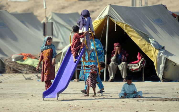<a><img src="https://www.theepochtimes.com/assets/uploads/2015/09/107350378.jpg" alt="Pakistani flood-affected children play in a relief camp in Sehwan on Dec. 3, 2010.  (Rizwan Tabassum/AFP/Getty Images)" title="Pakistani flood-affected children play in a relief camp in Sehwan on Dec. 3, 2010.  (Rizwan Tabassum/AFP/Getty Images)" width="320" class="size-medium wp-image-1811059"/></a>