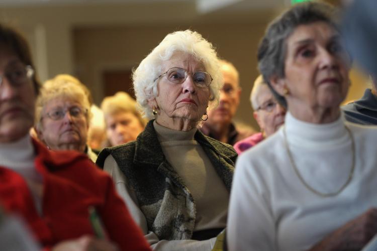 <a><img src="https://www.theepochtimes.com/assets/uploads/2015/09/107361397.jpg" alt="Seniors attend a 'Medicare Monday' seminar at the Holly Creek retirement community on December 6, 2010 in Centennial, Colorado. (John Moore/Getty Images)" title="Seniors attend a 'Medicare Monday' seminar at the Holly Creek retirement community on December 6, 2010 in Centennial, Colorado. (John Moore/Getty Images)" width="320" class="size-medium wp-image-1810087"/></a>