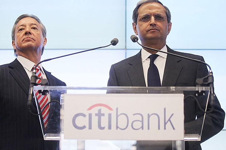 <a><img src="https://www.theepochtimes.com/assets/uploads/2015/09/107632679.jpg" alt="POSITIVE RETURNS: Citibank CEO Vikram Pandit (R) speaks at the official opening of Citibank's new flagship branch at Union Square on Dec. 16, 2010, in New York City. (Mario Tama/Getty Images)" title="POSITIVE RETURNS: Citibank CEO Vikram Pandit (R) speaks at the official opening of Citibank's new flagship branch at Union Square on Dec. 16, 2010, in New York City. (Mario Tama/Getty Images)" width="320" class="size-medium wp-image-1800779"/></a>