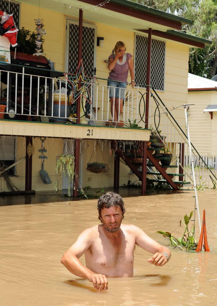 <a><img src="https://www.theepochtimes.com/assets/uploads/2015/09/107897464.jpg" alt="Australia floods: Gary Russell (front) waits for his wife Robyn (top) and dogs to be evacuated by emergency personnel from their flood affected home in Rockhampton on Jan. 6, 2011. (Torsten Blackwood/AFP/Getty Images)" title="Australia floods: Gary Russell (front) waits for his wife Robyn (top) and dogs to be evacuated by emergency personnel from their flood affected home in Rockhampton on Jan. 6, 2011. (Torsten Blackwood/AFP/Getty Images)" width="320" class="size-medium wp-image-1810048"/></a>