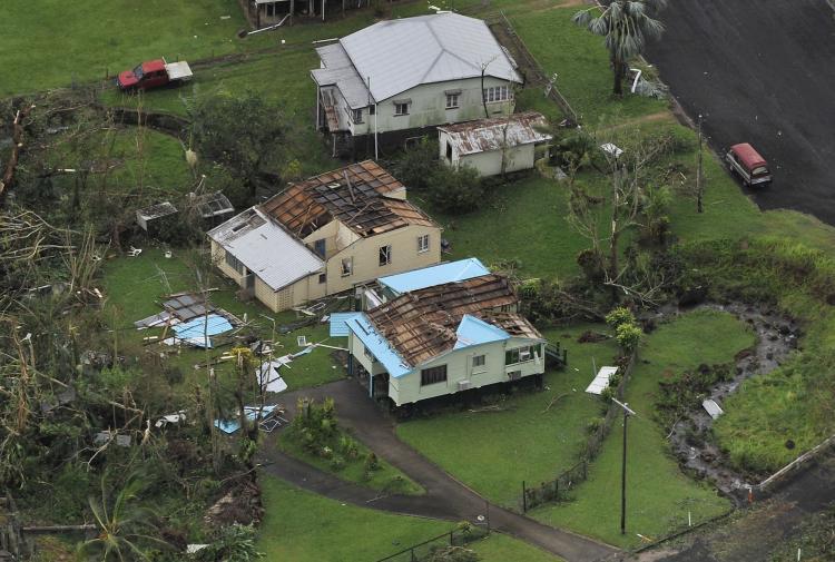 <a><img src="https://www.theepochtimes.com/assets/uploads/2015/09/108796433.jpg" alt="Aerial view of buildings damaged after Cyclone Yasi hit the Queensland town of Tully on Feb. 3, 2011. (Paul Crock/AFP/Getty Images)" title="Aerial view of buildings damaged after Cyclone Yasi hit the Queensland town of Tully on Feb. 3, 2011. (Paul Crock/AFP/Getty Images)" width="320" class="size-medium wp-image-1808805"/></a>