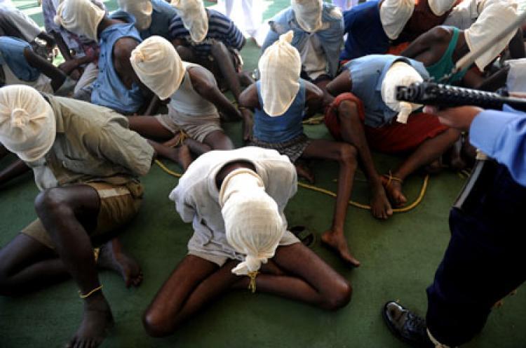 <a><img src="https://www.theepochtimes.com/assets/uploads/2015/09/108967095.jpg" alt="Suspected Somali pirates sit with their faces covered during a media interaction on board an Indian Coast guard ship off the coast of Mumbai on February 10, 2011. Twenty eight suspected pirates were brought to Mumbai on February 10 for questioning over an alleged attack as Coastguard Inspector General S.P.S. (Punit Paranipe/Getty Images)" title="Suspected Somali pirates sit with their faces covered during a media interaction on board an Indian Coast guard ship off the coast of Mumbai on February 10, 2011. Twenty eight suspected pirates were brought to Mumbai on February 10 for questioning over an alleged attack as Coastguard Inspector General S.P.S. (Punit Paranipe/Getty Images)" width="320" class="size-medium wp-image-1808472"/></a>