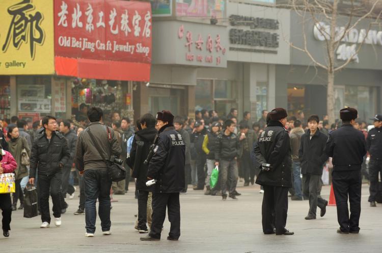 <a><img src="https://www.theepochtimes.com/assets/uploads/2015/09/109309791.jpg" alt="Police keep watch along the Wanfujing shopping street in Beijing after protesters gathered on February 20, 2011. A website claiming to represent China's homegrown Jasmine Revolution has called on the populace to take to the streets, every Saturday at 6:00pm.   (Peter Parks/Getty Images)" title="Police keep watch along the Wanfujing shopping street in Beijing after protesters gathered on February 20, 2011. A website claiming to represent China's homegrown Jasmine Revolution has called on the populace to take to the streets, every Saturday at 6:00pm.   (Peter Parks/Getty Images)" width="320" class="size-medium wp-image-1807417"/></a>