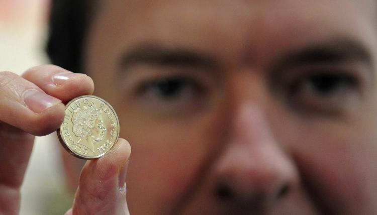 <a><img src="https://www.theepochtimes.com/assets/uploads/2015/09/109788912.jpg" alt="Chancellor of the Exchequer, George Osborne, poses for a photograph with a newly minted one pound coin during a visit to the Royal Mint, in Cardiff March 5, 2011. He was attending the  Conservative Party is in Wales annual spring forum. (Toby Melville - WPA Pool/Getty Images)" title="Chancellor of the Exchequer, George Osborne, poses for a photograph with a newly minted one pound coin during a visit to the Royal Mint, in Cardiff March 5, 2011. He was attending the  Conservative Party is in Wales annual spring forum. (Toby Melville - WPA Pool/Getty Images)" width="320" class="size-medium wp-image-1806363"/></a>