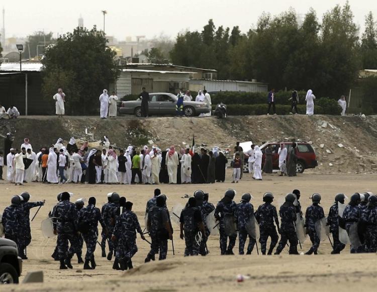 <a><img src="https://www.theepochtimes.com/assets/uploads/2015/09/109949331.jpg" alt="Kuwait's anti-riot police face hundreds of protesters demonstrating to demand citizenship and other rights in Jahra, 50kms west of Kuwait City, on March 11, 2011. (Yasser Al-Zayyat/Getty Images )" title="Kuwait's anti-riot police face hundreds of protesters demonstrating to demand citizenship and other rights in Jahra, 50kms west of Kuwait City, on March 11, 2011. (Yasser Al-Zayyat/Getty Images )" width="320" class="size-medium wp-image-1803742"/></a>