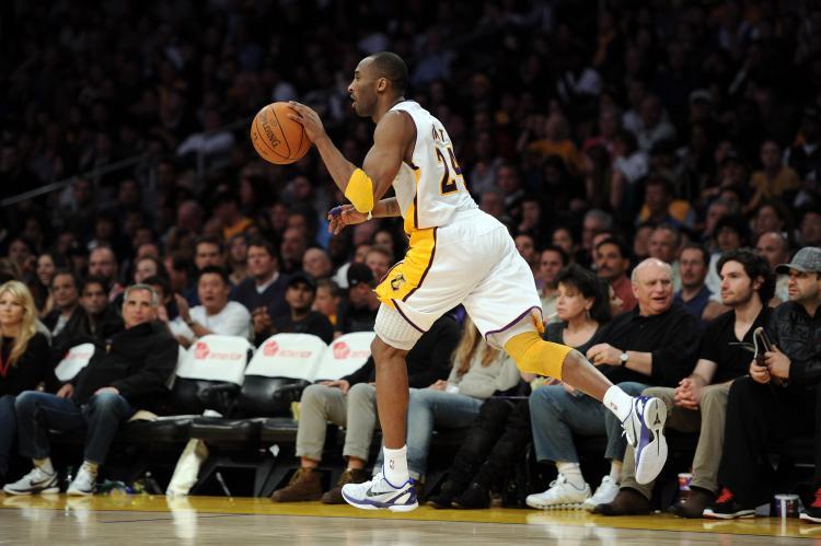 <a><img src="https://www.theepochtimes.com/assets/uploads/2015/09/110497499.jpg" alt="Kobe Bryant #24 of the Los Angeles Lakers takes the ball down court. The LA Lakers beat the Suns 111-103, on Tuesday night's game at Staples Center in Los Angeles, Ca.   (Harry How/Getty Images)" title="Kobe Bryant #24 of the Los Angeles Lakers takes the ball down court. The LA Lakers beat the Suns 111-103, on Tuesday night's game at Staples Center in Los Angeles, Ca.   (Harry How/Getty Images)" width="320" class="size-medium wp-image-1806467"/></a>