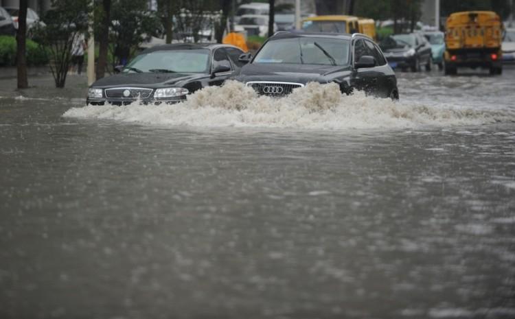 <a><img src="https://www.theepochtimes.com/assets/uploads/2015/09/1106142006541820.jpg" alt="Flooded streets in Wuhan on June 14 after days of rain. (AFP photo)" title="Flooded streets in Wuhan on June 14 after days of rain. (AFP photo)" width="320" class="size-medium wp-image-1802679"/></a>