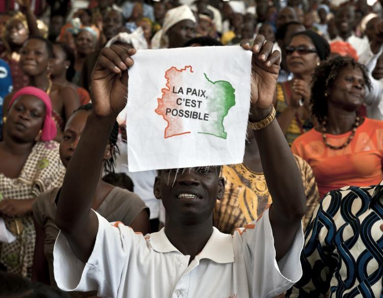<a><img src="https://www.theepochtimes.com/assets/uploads/2015/09/110938378.jpg" alt="An Ivorian man displays a message on a piece of fabric reading in French 'Peace is possible' as 5.000 Ivorians gather on March 27, 2011 at the Culture Palace of Abidjan to pray for victory and peace. The four months' post electoral crisis was put to an end on April 11 with the arrest of the former President Laurent Gbagbo.  (Jean-Philippe Ksiazek/Getty Images )" title="An Ivorian man displays a message on a piece of fabric reading in French 'Peace is possible' as 5.000 Ivorians gather on March 27, 2011 at the Culture Palace of Abidjan to pray for victory and peace. The four months' post electoral crisis was put to an end on April 11 with the arrest of the former President Laurent Gbagbo.  (Jean-Philippe Ksiazek/Getty Images )" width="320" class="size-medium wp-image-1805623"/></a>