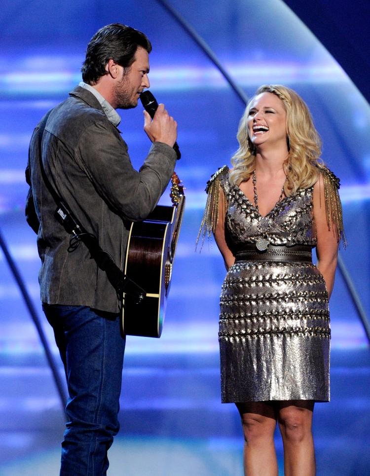 <a><img src="https://www.theepochtimes.com/assets/uploads/2015/09/111652103.jpg" alt="Miranda Lambert (R) appears with musician Blake Shelton (L) at a concert in Las Vegas, Nevada. Lambert will be dueting with a finalist in NBC's 'The Voice'. (Ethan Miller/Getty Images)" title="Miranda Lambert (R) appears with musician Blake Shelton (L) at a concert in Las Vegas, Nevada. Lambert will be dueting with a finalist in NBC's 'The Voice'. (Ethan Miller/Getty Images)" width="320" class="size-medium wp-image-1801970"/></a>