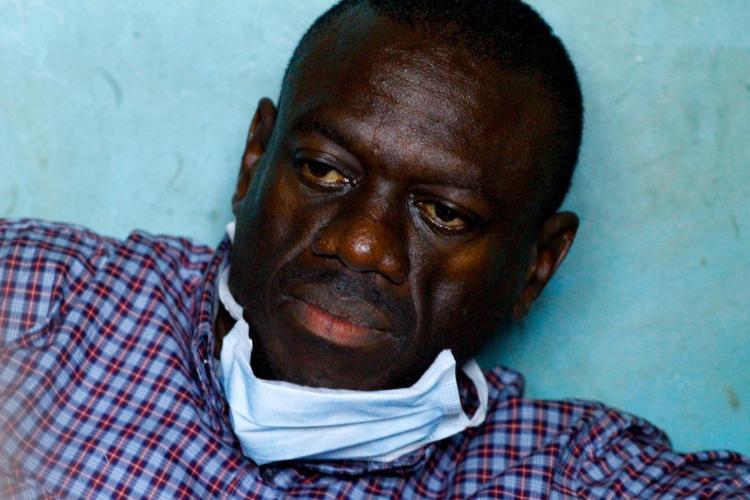 <a><img src="https://www.theepochtimes.com/assets/uploads/2015/09/111972717.jpg" alt="Ugandan opposition leader Kizza Besigye at the Kasangati police station after being arrested close to his house on April 11.  (Marc Hofer/Getty Images)" title="Ugandan opposition leader Kizza Besigye at the Kasangati police station after being arrested close to his house on April 11.  (Marc Hofer/Getty Images)" width="320" class="size-medium wp-image-1805690"/></a>