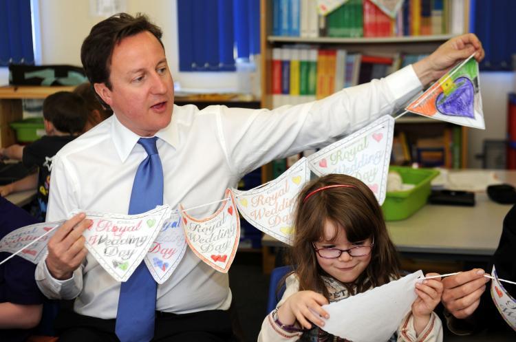 <a><img src="https://www.theepochtimes.com/assets/uploads/2015/09/111979460.jpg" alt="David Cameron makes royal wedding bunting with pupils at the English Martyrs RC Primary School in Manchester, north-west England, on April 11, 2011. He has urged the public to go ahead with royal wedding street parties. (Owen Humphrey/AFP/Getty Images)" title="David Cameron makes royal wedding bunting with pupils at the English Martyrs RC Primary School in Manchester, north-west England, on April 11, 2011. He has urged the public to go ahead with royal wedding street parties. (Owen Humphrey/AFP/Getty Images)" width="575" class="size-medium wp-image-1805563"/></a>