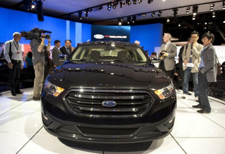 <a><img class="size-medium wp-image-1805152" title="Media get a close look at a Ford Taurus April 20, 2011 during the New York Auto show in New York.Auto makers from around the world gathered to introduce their latest models.  (Don Emmert/AFP/Getty Images)" src="https://www.theepochtimes.com/assets/uploads/2015/09/112721216.jpg" alt="Media get a close look at a Ford Taurus April 20, 2011 during the New York Auto show in New York.Auto makers from around the world gathered to introduce their latest models.  (Don Emmert/AFP/Getty Images)" width="320"/></a>