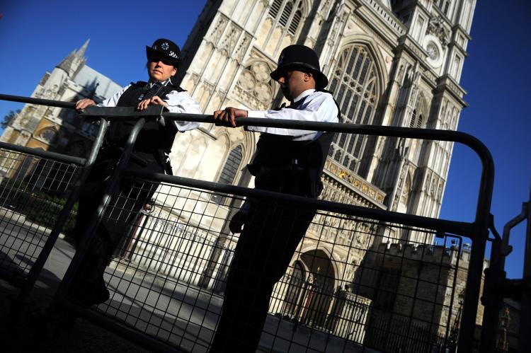 <a><img src="https://www.theepochtimes.com/assets/uploads/2015/09/113212669.jpg" alt="Police officers stand guard in the grounds of Westminster Abbey in London on April 27. To prevent any protests from forming, authorities are closely watching Facebook and Twitter for any signs of event planning. (Dimitar Dilkoff/AFP/Getty Images)" title="Police officers stand guard in the grounds of Westminster Abbey in London on April 27. To prevent any protests from forming, authorities are closely watching Facebook and Twitter for any signs of event planning. (Dimitar Dilkoff/AFP/Getty Images)" width="320" class="size-medium wp-image-1804864"/></a>