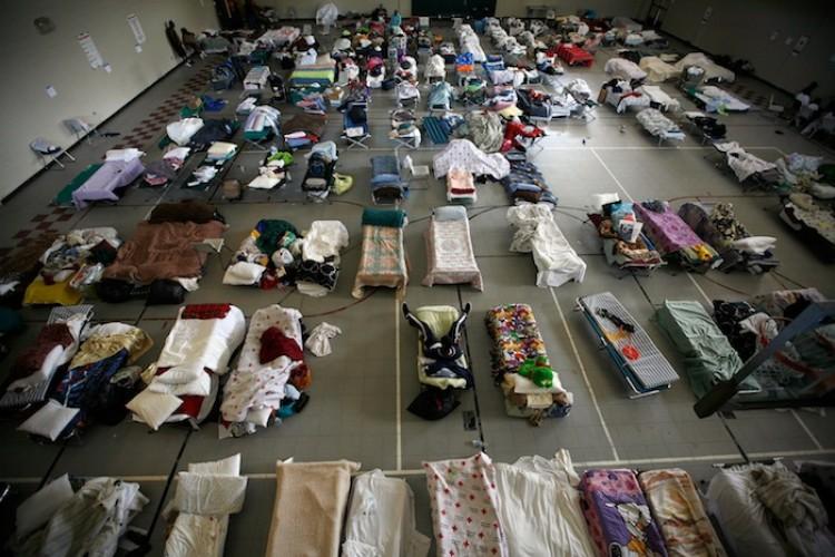 <a><img src="https://www.theepochtimes.com/assets/uploads/2015/09/113486850.jpg" alt="People rest in the sleeping area of a Red Cross Shelter on May 2,  in Tuscaloosa, Alabama. The Red Cross Shelter is housed more than 260 area residents after massive storms rolled through the area.   (Tom Pennington/Getty Images)" title="People rest in the sleeping area of a Red Cross Shelter on May 2,  in Tuscaloosa, Alabama. The Red Cross Shelter is housed more than 260 area residents after massive storms rolled through the area.   (Tom Pennington/Getty Images)" width="320" class="size-medium wp-image-1802316"/></a>