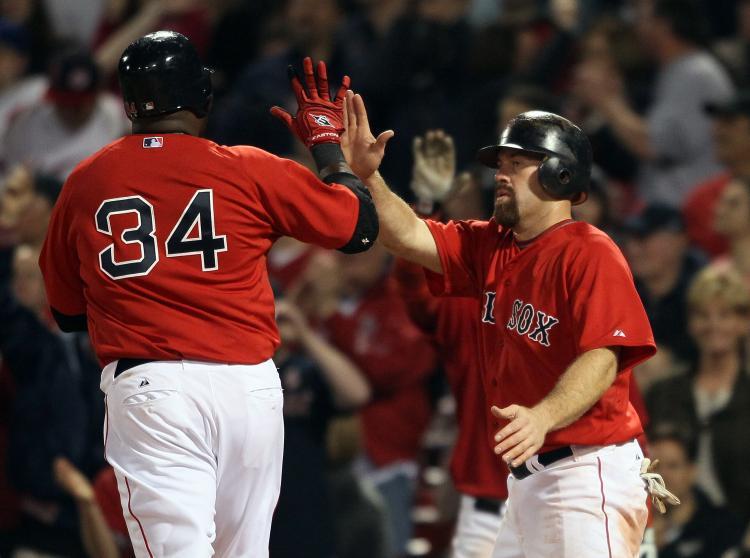 <a><img src="https://www.theepochtimes.com/assets/uploads/2015/09/114473466.jpg" alt="Kevin Youkilis #20 and David Ortiz #34 of the Boston Red Sox celebrate after they scored against the Chicago Cubs on May 20, 2011 at Fenway Park in Boston, Massachusetts (Elsa/Getty Images)" title="Kevin Youkilis #20 and David Ortiz #34 of the Boston Red Sox celebrate after they scored against the Chicago Cubs on May 20, 2011 at Fenway Park in Boston, Massachusetts (Elsa/Getty Images)" width="320" class="size-medium wp-image-1803768"/></a>