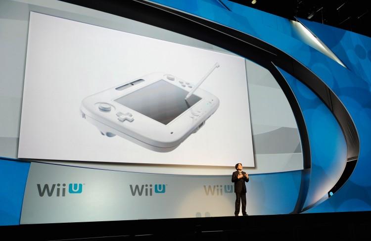 <a><img src="https://www.theepochtimes.com/assets/uploads/2015/09/115472228.jpg" alt="Satoru Iwata, Global President, Nintendo Co., Ltd., speaks during a news conference after the unveiling of the new game console Wii U at the Electronic Entertainment Expo on June 7, in Los Angeles, California.  (Kevork Djansezian/Getty Images)" title="Satoru Iwata, Global President, Nintendo Co., Ltd., speaks during a news conference after the unveiling of the new game console Wii U at the Electronic Entertainment Expo on June 7, in Los Angeles, California.  (Kevork Djansezian/Getty Images)" width="575" class="size-medium wp-image-1803085"/></a>