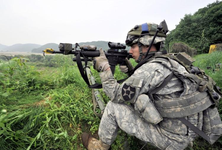 <a><img src="https://www.theepochtimes.com/assets/uploads/2015/09/115556596.jpg" alt="A US soldier takes a position during a joint military drill between South Korea and the US in Paju near the inter-Korean border on June 8, 2011. (Jung Yeon-Je/AFP/Getty Images)" title="A US soldier takes a position during a joint military drill between South Korea and the US in Paju near the inter-Korean border on June 8, 2011. (Jung Yeon-Je/AFP/Getty Images)" width="575" class="size-medium wp-image-1803038"/></a>