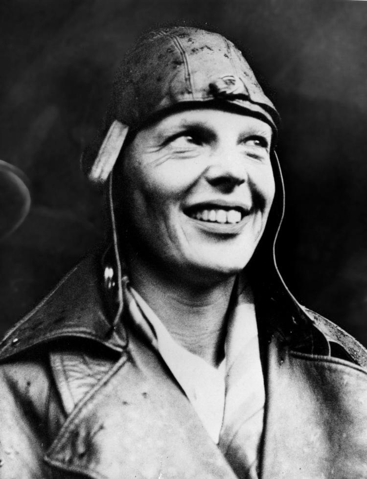 <a><img src="https://www.theepochtimes.com/assets/uploads/2015/09/1161349.jpg" alt="American aviator Amelia Earhart smiles May 22, 1932 upon arriving in London, England having become the first woman to fly across the Atlantic alone.  (Getty Images)" title="American aviator Amelia Earhart smiles May 22, 1932 upon arriving in London, England having become the first woman to fly across the Atlantic alone.  (Getty Images)" width="320" class="size-medium wp-image-1816969"/></a>
