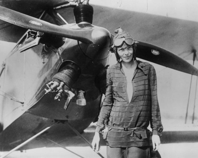 <a><img src="https://www.theepochtimes.com/assets/uploads/2015/09/1161352.jpg" alt="Amelia Earhart stands June 14, 1928 in front of her bi-plane called 'Friendship' in Newfoundland. Earhart (1898 - 1937) disappeared without trace over the Pacific Ocean in her attempt to fly around the world in 1937.  (Photo by Getty Images)" title="Amelia Earhart stands June 14, 1928 in front of her bi-plane called 'Friendship' in Newfoundland. Earhart (1898 - 1937) disappeared without trace over the Pacific Ocean in her attempt to fly around the world in 1937.  (Photo by Getty Images)" width="320" class="size-medium wp-image-1809807"/></a>