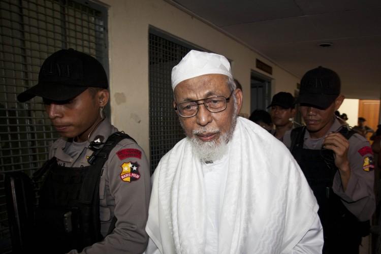 <a><img src="https://www.theepochtimes.com/assets/uploads/2015/09/116493449.jpg" alt="Muslim cleric Abu Bakar Bashir is escorted by police to his hearing verdict at the South Jakarta District Court on June 16, in Jakarta, Indonesia. Bashir was found guilty and sentenced to 15 years in prison on terrorism charges.   (Ulet Ifansasti/Getty Images)" title="Muslim cleric Abu Bakar Bashir is escorted by police to his hearing verdict at the South Jakarta District Court on June 16, in Jakarta, Indonesia. Bashir was found guilty and sentenced to 15 years in prison on terrorism charges.   (Ulet Ifansasti/Getty Images)" width="320" class="size-medium wp-image-1802635"/></a>