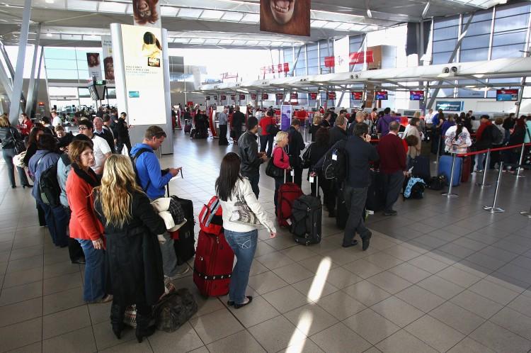 <a><img src="https://www.theepochtimes.com/assets/uploads/2015/09/117073105.jpg" alt="A queue forms at the Virgin Australia Terminal as airlines cancel flights due to volcanic ash at Sydney Domestic Airport on June 21, 2011 (Ryan Pierse/Getty Images)" title="A queue forms at the Virgin Australia Terminal as airlines cancel flights due to volcanic ash at Sydney Domestic Airport on June 21, 2011 (Ryan Pierse/Getty Images)" width="575" class="size-medium wp-image-1802378"/></a>