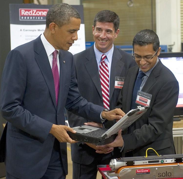 <a><img src="https://www.theepochtimes.com/assets/uploads/2015/09/117207068_RedZoneRobotics.jpg" alt="EMERGING TECHNOLOGIES : President Barack Obama (L) controls SOLO, a pipe inspection robot from RedZone Robotics, during a tour of the National Robotics Engineering Center prior to speaking on technology and the economy at Carnegie Mellon University in Pittsburgh, Penn., June 24. (Saul Loeb/AFP/Getty Images)" title="EMERGING TECHNOLOGIES : President Barack Obama (L) controls SOLO, a pipe inspection robot from RedZone Robotics, during a tour of the National Robotics Engineering Center prior to speaking on technology and the economy at Carnegie Mellon University in Pittsburgh, Penn., June 24. (Saul Loeb/AFP/Getty Images)" width="320" class="size-medium wp-image-1801926"/></a>