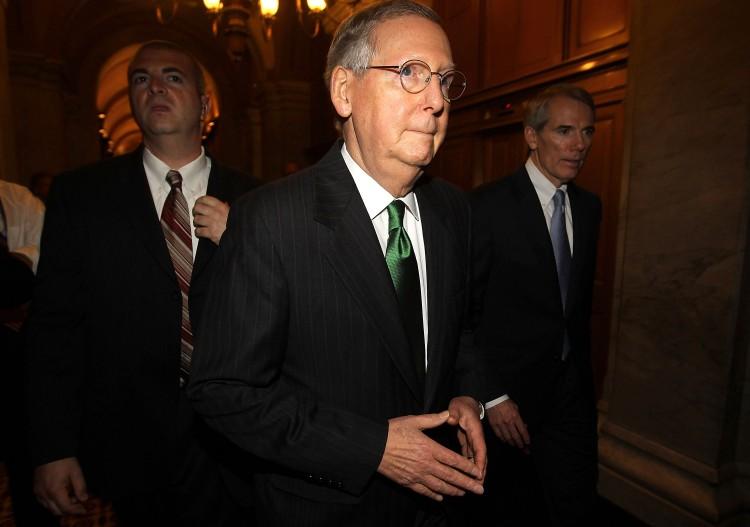 <a><img src="https://www.theepochtimes.com/assets/uploads/2015/09/119051125_Mitch_McConnel.jpg" alt="DEBT CEILING NEGOTIATING: Senate Minority Leader Sen. Mitch McConnell (R-Ky) (C) walks with Sen. Rob Portman (R-Ohio) (R) as he leaves the Capitol for a meeting at the White House July 14.  (Alex Wong/Getty Images)" title="DEBT CEILING NEGOTIATING: Senate Minority Leader Sen. Mitch McConnell (R-Ky) (C) walks with Sen. Rob Portman (R-Ohio) (R) as he leaves the Capitol for a meeting at the White House July 14.  (Alex Wong/Getty Images)" width="320" class="size-medium wp-image-1800725"/></a>