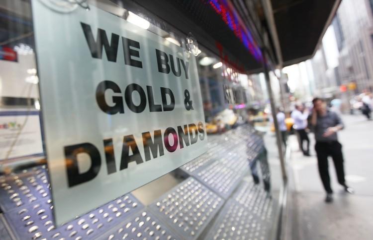 <a><img src="https://www.theepochtimes.com/assets/uploads/2015/09/119328522.jpg" alt="NEW RECORD: A 'We Buy Gold & Diamonds' sign is seen in Manhattan's Diamond District, July 18. The price of gold rose above $1600 an ounce Monday, setting a new all-time record.  (Mario Tama/Getty Images)" title="NEW RECORD: A 'We Buy Gold & Diamonds' sign is seen in Manhattan's Diamond District, July 18. The price of gold rose above $1600 an ounce Monday, setting a new all-time record.  (Mario Tama/Getty Images)" width="320" class="size-medium wp-image-1800721"/></a>