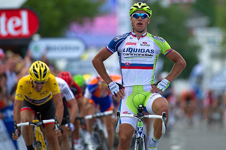 <a><img class="size-full wp-image-1785472" title="Slovakia's Peter Sagan (R) celebrates on" src="https://www.theepochtimes.com/assets/uploads/2015/09/11Sagan147513345WEB.jpg" alt="Peter Sagan (R) crosses the finish line ahead of Fabian Cancellara to win Stage One of the 2012 Tour de France. (Lionel Bonaventure/AFP/GettyImages)" width="750" height="500"/></a>