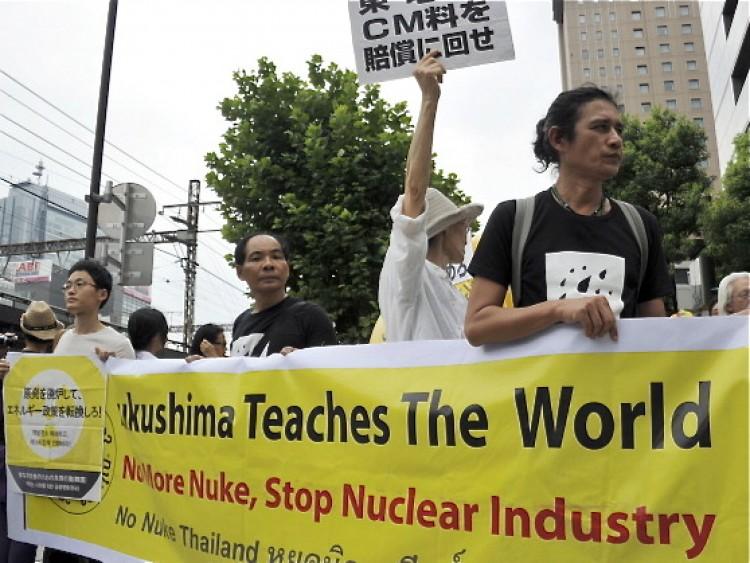 <a><img src="https://www.theepochtimes.com/assets/uploads/2015/09/120239518.jpg" alt="Demonstrators during a protest outside the Tokyo Electric Power Co (TEPCO) headquarters in Tokyo, on Aug. 2, 2011, against the nuclear accident at the Fukushima Daiichi.  (Yoshikazu Tsuno/AFP/Getty Images)" title="Demonstrators during a protest outside the Tokyo Electric Power Co (TEPCO) headquarters in Tokyo, on Aug. 2, 2011, against the nuclear accident at the Fukushima Daiichi.  (Yoshikazu Tsuno/AFP/Getty Images)" width="200" class="size-medium wp-image-1798853"/></a>