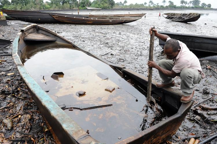 <a><img src="https://www.theepochtimes.com/assets/uploads/2015/09/121229680.jpg" alt="An indigene of Bodo, Ogoniland region in Rivers State, tries to separate with a stick the crude oil from water in a boat at the Bodo waterways polluted by oil spills attributed to Shell equipment failure August 11, 2011. The Bodo community in the oil-producing Niger Delta region sued Shell oil company in the United Kingdom, alleging that spills in 2008 and 2009 had destroyed the environment and ruined their livelihoods. The UN released a report this month saying decades of oil spills in the Nigerian region of Ogoniland may require the biggest cleanup ever undertaken, with communities dependent upon farmers and fishermen left ravaged. (Pius Utom Ekpei/AFP/Getty Images)" title="An indigene of Bodo, Ogoniland region in Rivers State, tries to separate with a stick the crude oil from water in a boat at the Bodo waterways polluted by oil spills attributed to Shell equipment failure August 11, 2011. The Bodo community in the oil-producing Niger Delta region sued Shell oil company in the United Kingdom, alleging that spills in 2008 and 2009 had destroyed the environment and ruined their livelihoods. The UN released a report this month saying decades of oil spills in the Nigerian region of Ogoniland may require the biggest cleanup ever undertaken, with communities dependent upon farmers and fishermen left ravaged. (Pius Utom Ekpei/AFP/Getty Images)" width="320" class="size-medium wp-image-1798802"/></a>