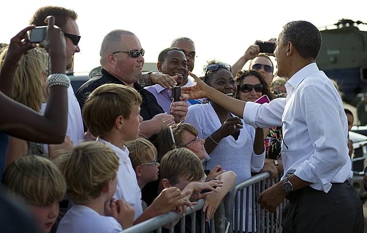 <a><img src="https://www.theepochtimes.com/assets/uploads/2015/09/121359230.jpg" alt="US President Barack Obama shakes hands as he arrives at the Cape Cod Coast Guard Air Station in Cape Cod, Massachusetts, on August 18. Obama administration said Thursday it would postpone the deportation of illegal immigrants without criminal records and allow them to apply for work permits as it reviews over 300,000 cases.  (JIM WATSON/AFP/Getty Images)" title="US President Barack Obama shakes hands as he arrives at the Cape Cod Coast Guard Air Station in Cape Cod, Massachusetts, on August 18. Obama administration said Thursday it would postpone the deportation of illegal immigrants without criminal records and allow them to apply for work permits as it reviews over 300,000 cases.  (JIM WATSON/AFP/Getty Images)" width="320" class="size-medium wp-image-1799040"/></a>