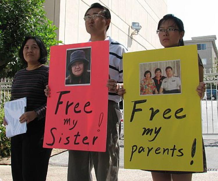 <a><img src="https://www.theepochtimes.com/assets/uploads/2015/09/1219227310.jpg" alt="(L-R) Yaning Liu, Jason Si, and Jin Pang each have family members in China imprisoned by the Chinese regime because they practice Falun Gong.  (The Epoch Times)" title="(L-R) Yaning Liu, Jason Si, and Jin Pang each have family members in China imprisoned by the Chinese regime because they practice Falun Gong.  (The Epoch Times)" width="320" class="size-medium wp-image-1834086"/></a>