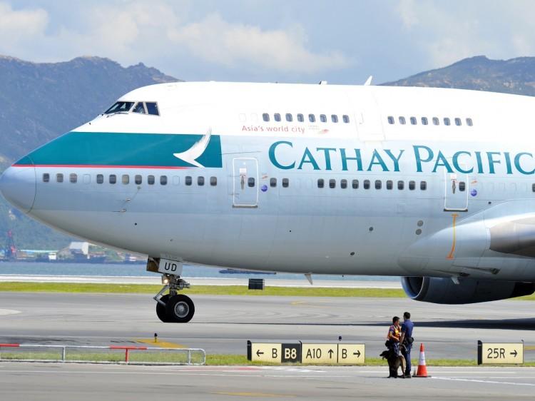 <a><img src="https://www.theepochtimes.com/assets/uploads/2015/09/122090087.jpg" alt="A Cathay Pacific 747 passenger plane taxis upon landing at Hong Kong's international airport, Aug. 16. (Laurent Fievet/AFP/Getty Images)" title="A Cathay Pacific 747 passenger plane taxis upon landing at Hong Kong's international airport, Aug. 16. (Laurent Fievet/AFP/Getty Images)" width="200" class="size-medium wp-image-1796934"/></a>