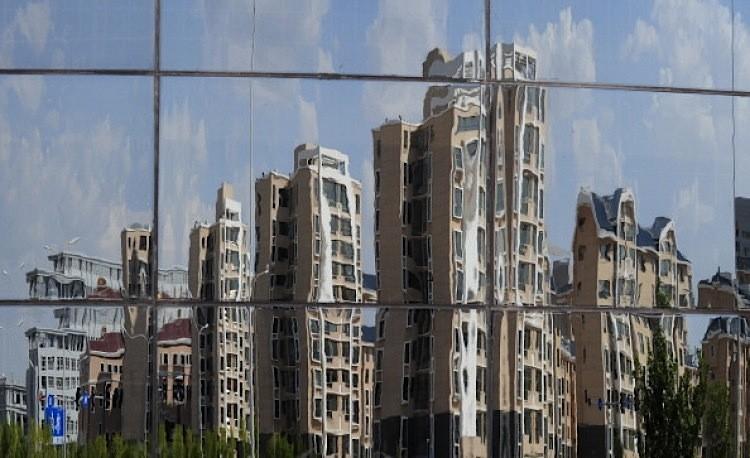 <a><img src="https://www.theepochtimes.com/assets/uploads/2015/09/125673432_crop.jpg" alt="Empty apartment buildings are reflected in a window in the city of Ordos, Inner Mongolia on Sept. 12, 2011. The city which is referred to as a 'Ghost Town' due to it's lack of people, is being built to house 1.5 million inhabitants. (Mark Ralston/AFP/Getty Images)" title="Empty apartment buildings are reflected in a window in the city of Ordos, Inner Mongolia on Sept. 12, 2011. The city which is referred to as a 'Ghost Town' due to it's lack of people, is being built to house 1.5 million inhabitants. (Mark Ralston/AFP/Getty Images)" width="320" class="size-medium wp-image-1797041"/></a>