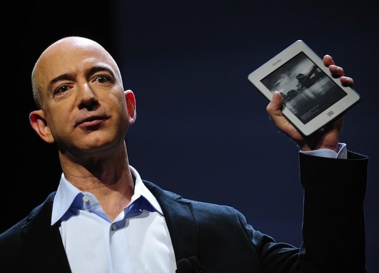<a><img src="https://www.theepochtimes.com/assets/uploads/2015/09/127501501_AmazonTablet.jpg" alt="Amazon CEO Jeff Bezos introduces the new Kindle Touch in New York, Sept. 28. Bezos introduced a line of four new Kindle products, the Kindle Fire tablet, the Kindle Touch 3G, the Kindle Touch and a new lighter and smaller Kindle. (Emmanuel Dunand/Getty Images)" title="Amazon CEO Jeff Bezos introduces the new Kindle Touch in New York, Sept. 28. Bezos introduced a line of four new Kindle products, the Kindle Fire tablet, the Kindle Touch 3G, the Kindle Touch and a new lighter and smaller Kindle. (Emmanuel Dunand/Getty Images)" width="575" class="size-medium wp-image-1797126"/></a>