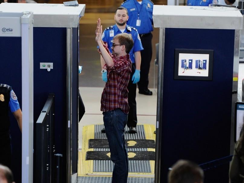 <a><img class="size-large wp-image-1784282" title="A traveler is screened by a body scanner at the security checkpoint in an airport. (Kevork Djansezian/Getty Images)" src="https://www.theepochtimes.com/assets/uploads/2015/09/133999879.jpg" alt="A traveler is screened by a body scanner at the security checkpoint in an airport. (Kevork Djansezian/Getty Images)" width="590" height="442"/></a>