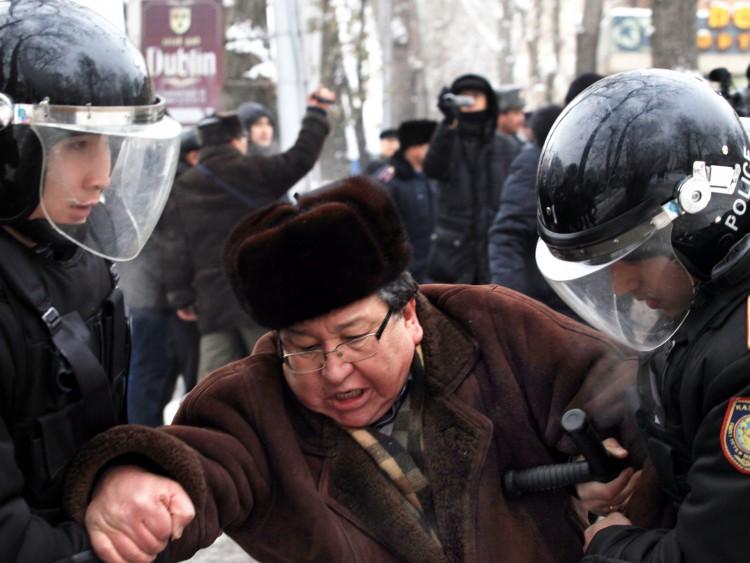 <a><img class="size-large wp-image-1774574" src="https://www.theepochtimes.com/assets/uploads/2015/09/136033582kazak.jpg" alt="Kazakh riot policemen detain an opposition supporter during a rally in Almaty on December 17, 2011. (Anatoly Ustinenko/AFP/Getty Images) " width="590" height="443"/></a>