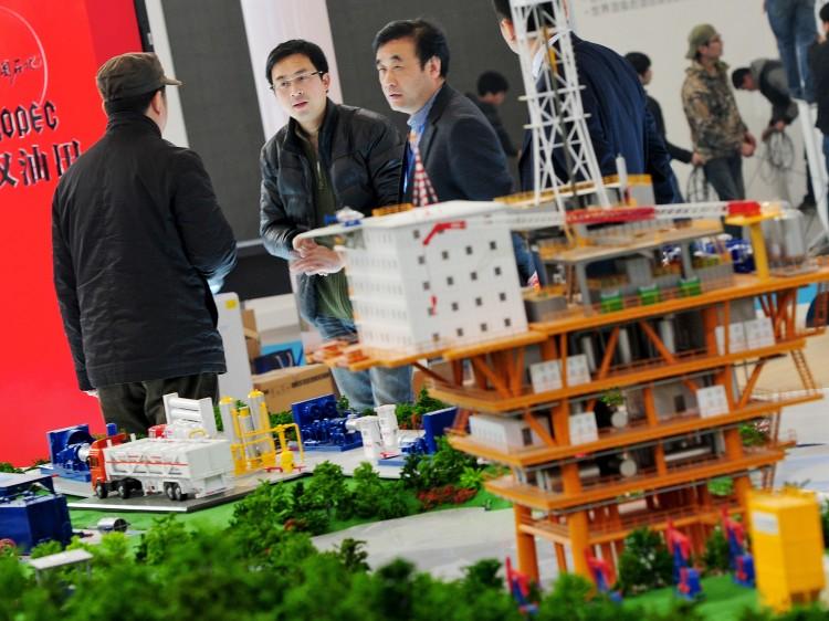 <a><img class="size-full wp-image-1774988" src="https://www.theepochtimes.com/assets/uploads/2015/09/141652420.jpg" alt="an oil and petroleum exploration exhibition in Beijing" width="750" height="562"/></a>