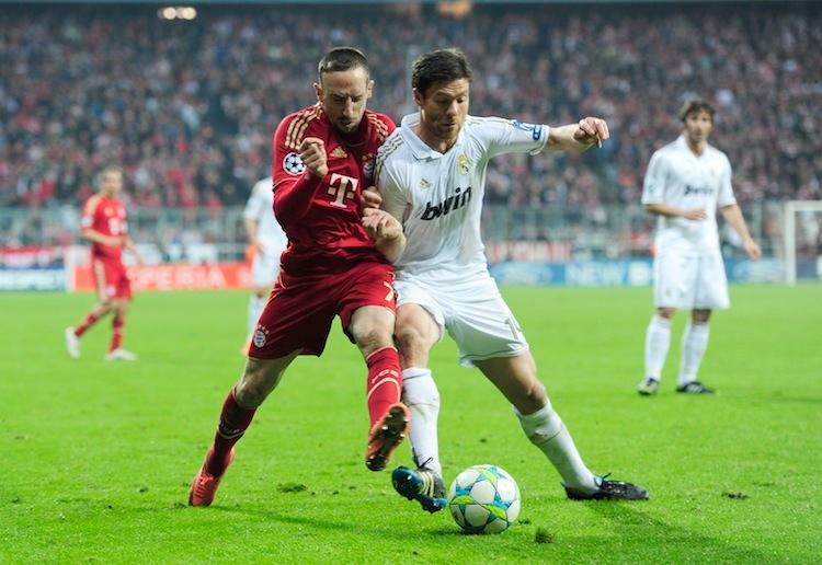 <a><img class="size-full wp-image-1788972" title="Bayern Munich's French midfielder Franck" src="https://www.theepochtimes.com/assets/uploads/2015/09/143014102.jpg" alt=" Franck Ribery and Xabi Alonso tangle in a tantalizing Champions League semifinal between Bayern Munich and Real Madrid on Tuesday in Munich. (Javier Soriano/AFP/Getty Images)" width="750" height="516"/></a>