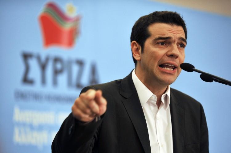 <a><img class="size-large wp-image-1786651" title="Greek radical leftist leader Alexis Tsip" src="https://www.theepochtimes.com/assets/uploads/2015/09/145524042.jpg" alt="Greek radical leftist leader Alexis Tsipras gestures during a presentation of his party's election platform in Athens, June 1. Tsipras vowed to renegotiate the country's bailout deal from scratch if his Syriza party wins crucial June 17 elections in Greece. (LOUISA GOULIAMAKI/AFP/GettyImages)" width="590" height="392"/></a>