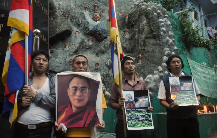 <a><img class="wp-image-1780671" title="Exiled Tibetans participate in a candle" src="https://www.theepochtimes.com/assets/uploads/2015/09/148466109.jpg" alt="" width="330" height="210"/></a>