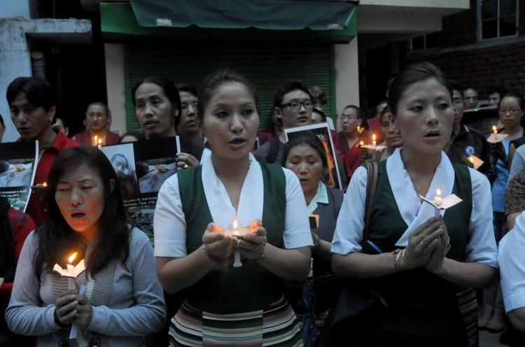 <a><img class="size-medium wp-image-1783247" title="Exiled Tibetans participate in a candle" src="https://www.theepochtimes.com/assets/uploads/2015/09/148466110.jpg" alt="" width="350" height="262"/></a>
