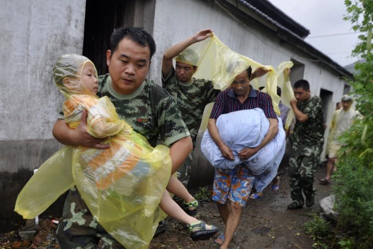 <a><img class="size-medium wp-image-1783651" title="Chinese rescuers help evacuate residents" src="https://www.theepochtimes.com/assets/uploads/2015/09/149933177.jpg" alt="" width="350" height="262"/></a>