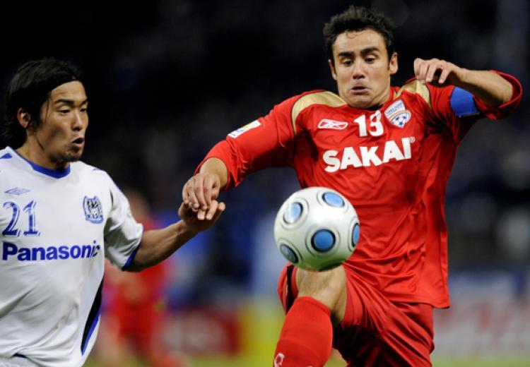 <a><img src="https://www.theepochtimes.com/assets/uploads/2015/09/14_AFL_84029631_1.jpg" alt="Adelaide United captain and midfielder Travis Dodd (R) and Gamba Osaka defender Akira Kaji (L) during the quarter-final match in the FIFA Club World Cup 2008 at the Toyota stadium in Toyota, Aichi prefecture, Japan, last Sunday December 14. (TOSHIFUMI KITAMURA/AFP/Getty Images)" title="Adelaide United captain and midfielder Travis Dodd (R) and Gamba Osaka defender Akira Kaji (L) during the quarter-final match in the FIFA Club World Cup 2008 at the Toyota stadium in Toyota, Aichi prefecture, Japan, last Sunday December 14. (TOSHIFUMI KITAMURA/AFP/Getty Images)" width="320" class="size-medium wp-image-1832353"/></a>