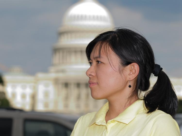 <a><img src="https://www.theepochtimes.com/assets/uploads/2015/09/1_20090719_Giragosian_JinPang-3.jpg" alt="Ms. Jin Pang seen at the Washington Mall with the U.S. Capitol in the background, on July 19, 2009, in Washington, D.C. (Jim Giragosian/Epoch Times Staff)" title="Ms. Jin Pang seen at the Washington Mall with the U.S. Capitol in the background, on July 19, 2009, in Washington, D.C. (Jim Giragosian/Epoch Times Staff)" width="320" class="size-medium wp-image-1820334"/></a>