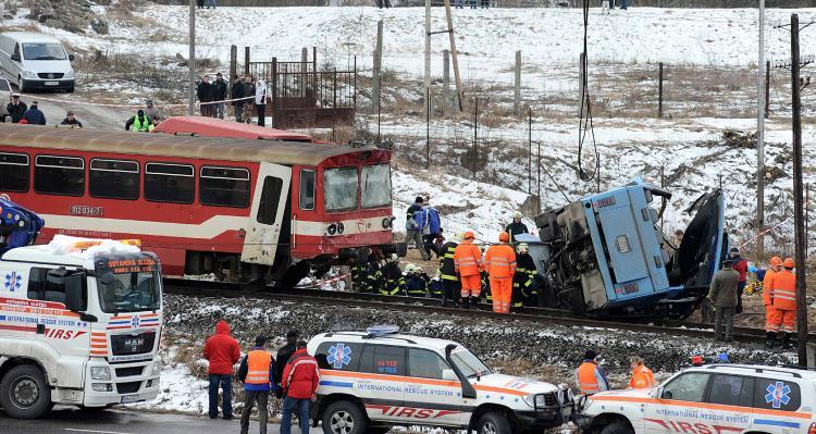 <a><img src="https://www.theepochtimes.com/assets/uploads/2015/09/1train84961036.jpg" alt="Twelve were killed when a train hit a bus in Polomka near Brezno, Slovakia.    (Samuel Kubani/AFP/Getty Images)" title="Twelve were killed when a train hit a bus in Polomka near Brezno, Slovakia.    (Samuel Kubani/AFP/Getty Images)" width="320" class="size-medium wp-image-1830086"/></a>