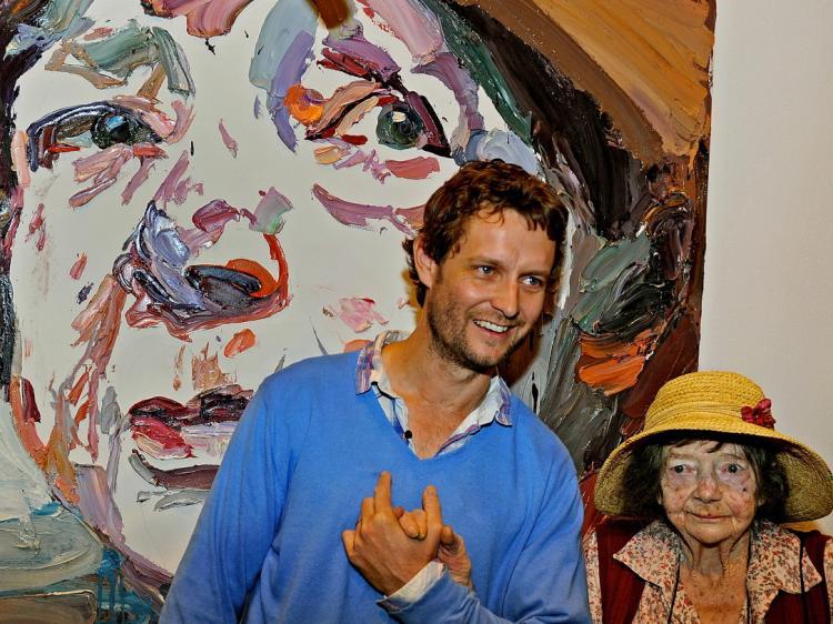 <a><img src="https://www.theepochtimes.com/assets/uploads/2015/09/2011Archibald112215002.jpg" alt="Artist Ben Quilty (C), stands with legendary Australian painter Margaret Olley (R), the subject of Ben's winning portrait entry (at back) in the prestigious Archibald Prize at the Art Gallery of New South Wales, on April 15.  (Greg Wood/AFP/Getty Images)" title="Artist Ben Quilty (C), stands with legendary Australian painter Margaret Olley (R), the subject of Ben's winning portrait entry (at back) in the prestigious Archibald Prize at the Art Gallery of New South Wales, on April 15.  (Greg Wood/AFP/Getty Images)" width="320" class="size-medium wp-image-1805394"/></a>